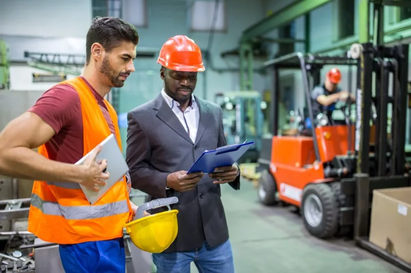 Workers on a job site representing work-related injury care